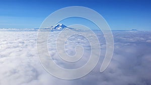 High altitude profile view of Mount Rainier St. Helens