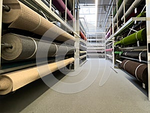 Carpet store. Carpets rolled up.