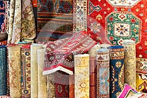 Carpets variety selection rolled up rugs shop store photo