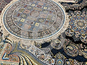 Carpets woven by hand with colorful patterns of beautiful hard work and a lot of small