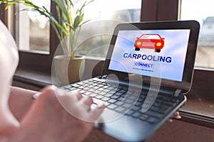 Carpooling concept on a laptop screen