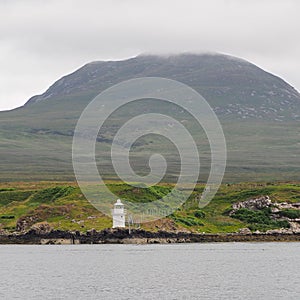 Carragh an t-Sruith lighthouse in the Sound of Islay near Feolin, Jura, Hebrides