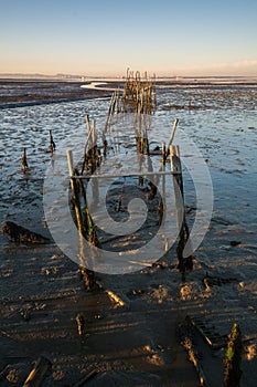 Carrasqueira Palafitic Pier in Comporta, Portugal at sunset