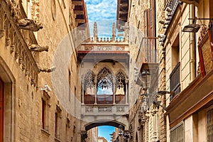 Carrer del Bisbe in Barcelona Gothic quarter, Spain photo