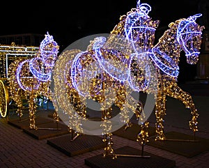 Carriage with horses made of light bulbs