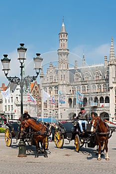 Carriages with cabbies in Bruges