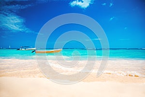 Carribean sea and boat on the shore, beautiful panoramic view