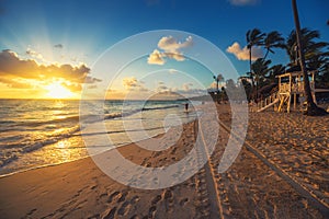 Carribean vacation, beautiful sunrise over tropical beach