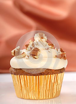 Carrot cake cupcake with cream cheese frosting