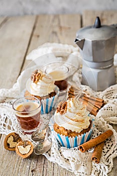 Carrot cake cupcakes with butter cream frosting