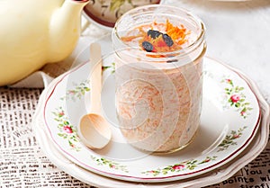 Carrot Cake Overnight Oats in to the jar