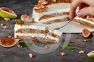 Carrot cake. Sweet slice of carrot cake on gray background