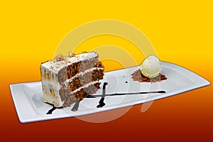 Carrot Cake on a white plate with ice cream on a yellow and red background