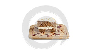 Carrot cake on a wooden board isolated on a white background