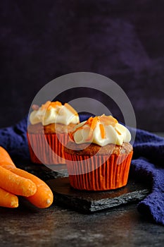 carrot cakes in close-up on a dark background