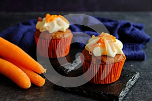 carrot cakes in close-up on a dark background