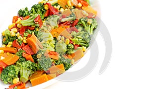 Carrot, corn, red pepper broccoli salad with isolated white background