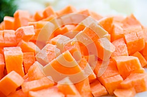 Carrot diced. Orange carrot cubes. Sliced â€‹â€‹carrots. Orange. root vegetable. Healthy diet. Proper nutrition.