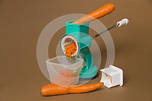 Carrot grater with a bole 