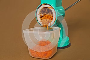 Carrot grater with a bole 