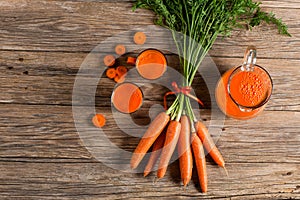 Carrot juice and carrot, above view