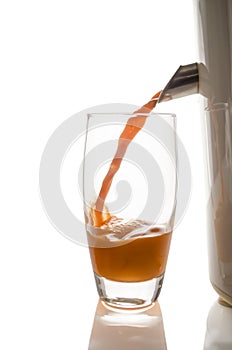Carrot juice with a juicer photo