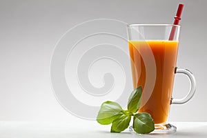 Carrot or orange juice in glass