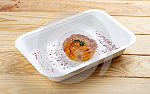 Carrot-orange muffin. Healthy diet. Takeaway food. On a wooden background