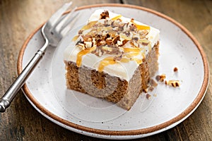 Carrot or pumpkin spiced cake with cream cheese frosting and pecan