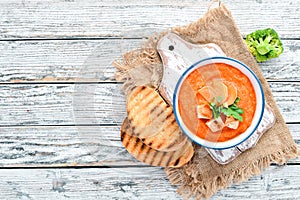 Carrot puree soup. with toast bread. Dietary food. Top view.