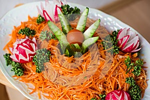 Carrot salad decorated with vegetables photo