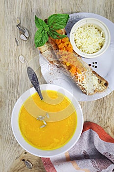 Carrot soup and bread topped