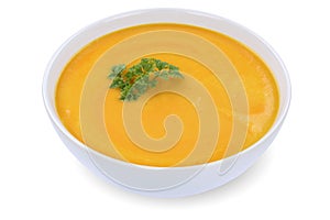 Carrot soup with carrots in bowl isolated