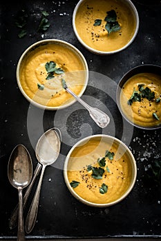 Carrot soup with fresh parsley on top