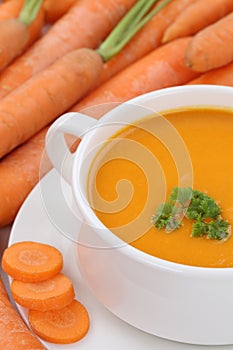 Carrot soup with many carrots closeup