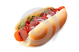 Carrot vegan hot dog with relish, ketchup and onions isolated on white