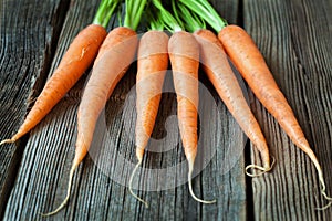 Carrots bunch of fresh organic vegetarian food on photo