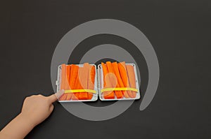 Carrots in a cigarette case. Smoking cessation concept, role model for children photo