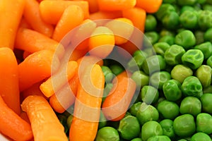 Carrots and green peas photo