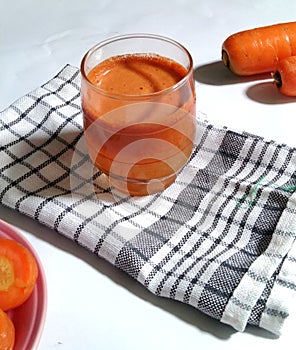 Carrots juice in the glass