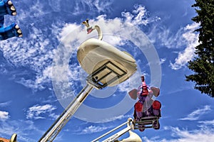 Carrousel white swan and violet elephant