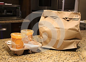 Carry Out or Take Away Food on a Kitchen Counter photo