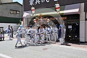 Carrying a divine palanquin