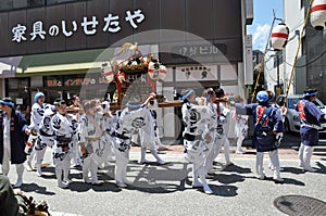 Carrying a divine palanquin