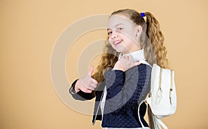 Carrying things in backpack. Learn how fit backpack correctly. Girl little fashionable cutie carry backpack. Popular