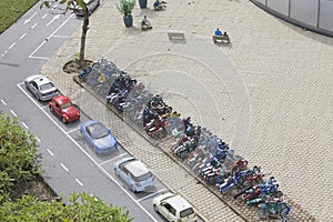 Cars and bicycles displayed at Miniature Town, Net