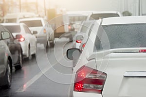 Cars brake on the road on night time.