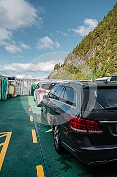 Cars on the car deck of road ferry Aukra between Eidsdal and Linge on Storfjorden, Norway