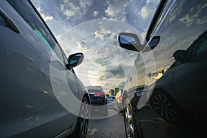 Cars on city street in traffic jam at rush hour