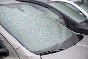 Cars covered with ice after freezing rain